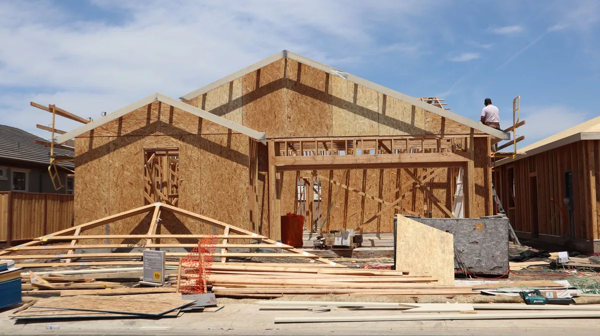 Modern new house exterior with construction materials