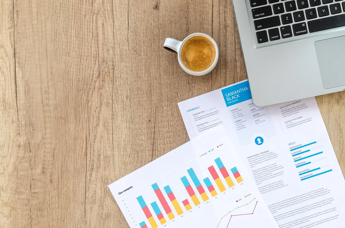 Rising bar chart showing interest rate trends on financial documents