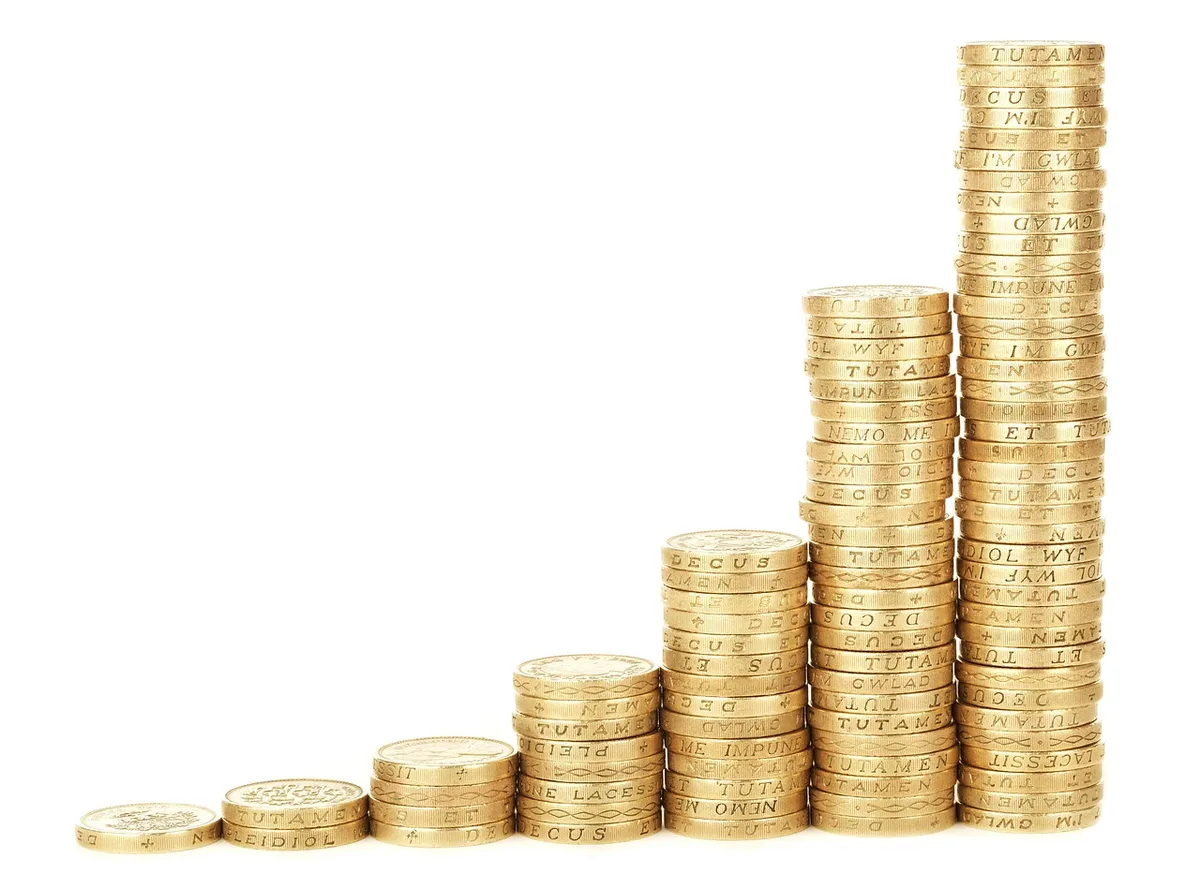 A rising bar chart displaying financial trends and interest rate movements