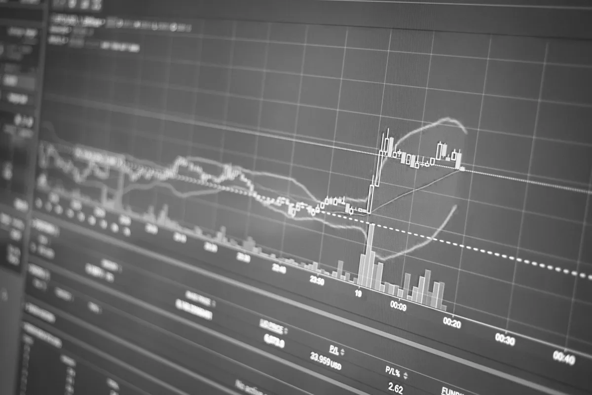 Rising bar chart on financial display showing interest rate trends