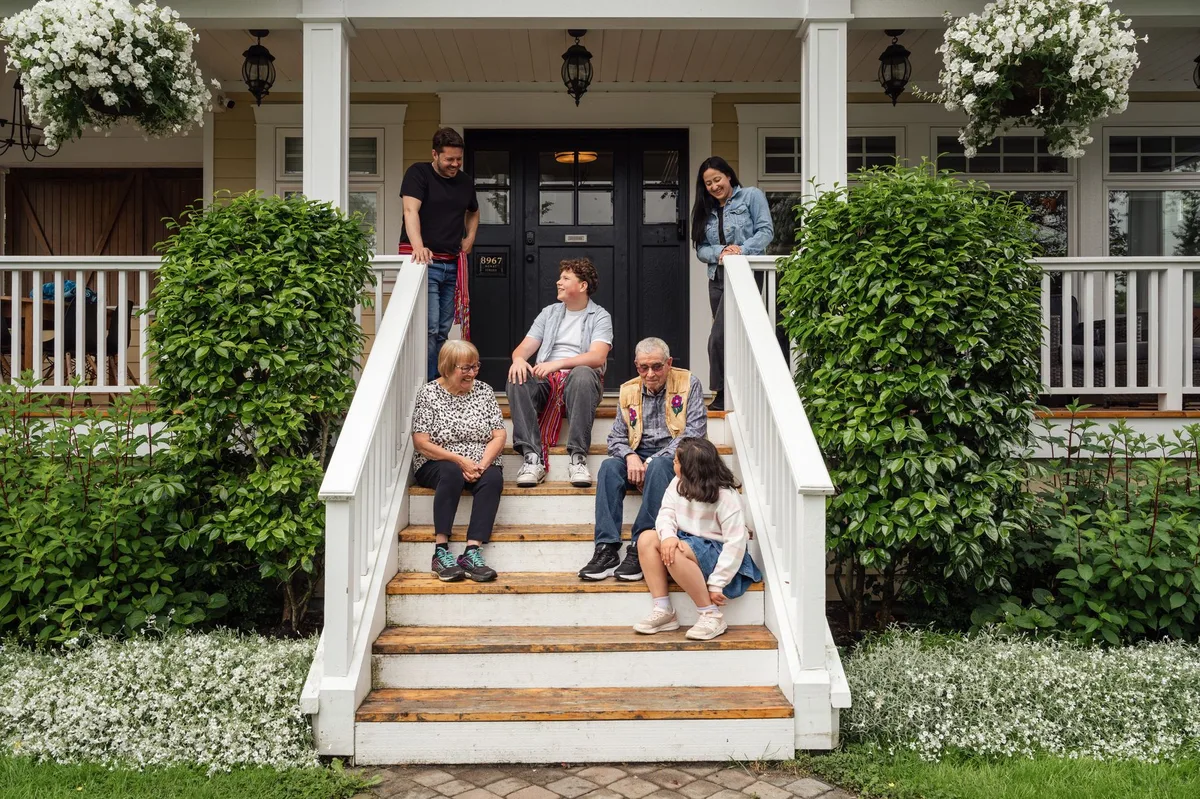 A multigenerational family gathered together in a comfortable home setting