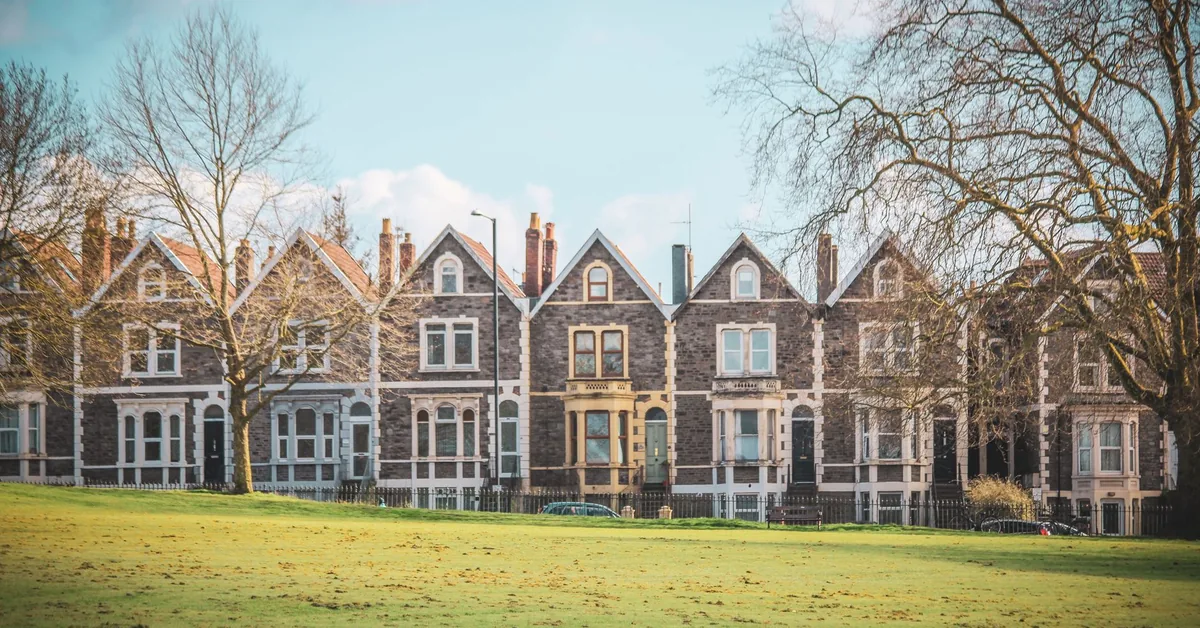 A calculator on mortgage paperwork used to review housing costs