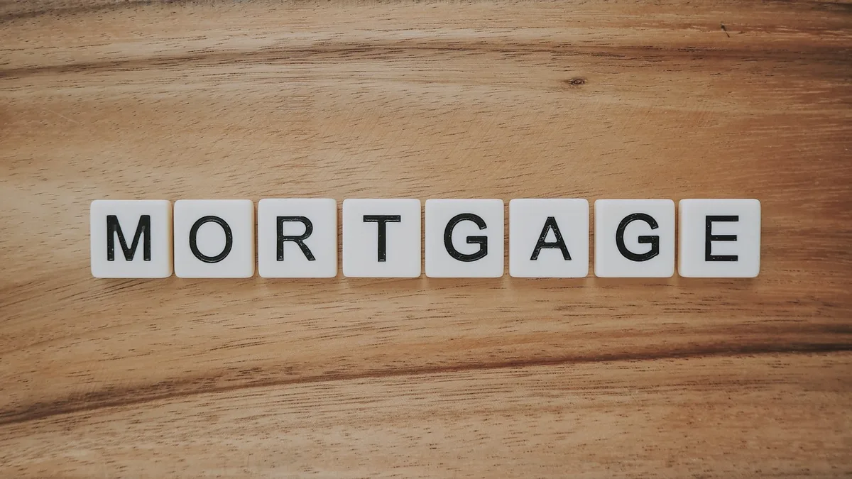 Mortgage and renovation paperwork arranged on a desk