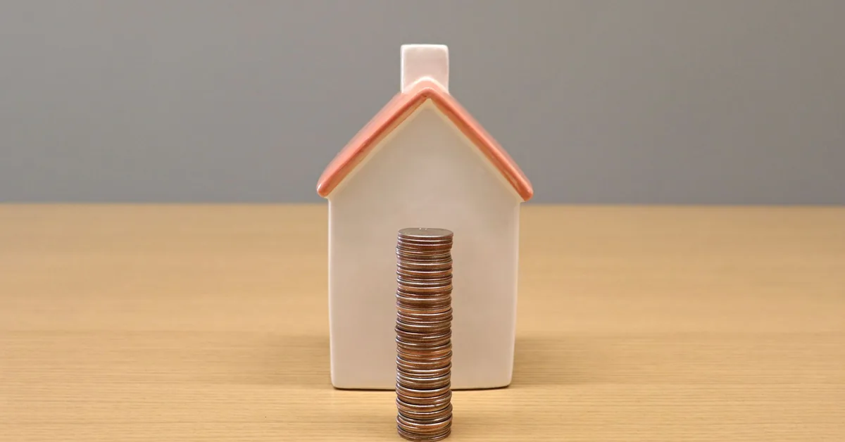 Mortgage documents and a pen on a desk