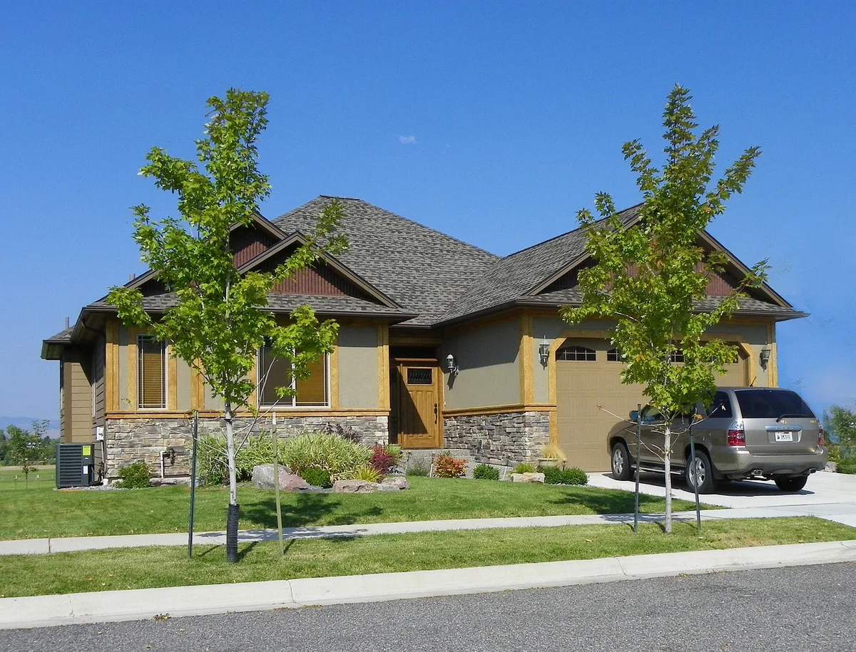 A traditional single-family home representing property eligible for HECM reverse mortgage programs